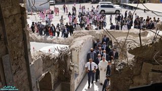 الرئيس الفرنسي في كنيسة “الساعة” بالموصل