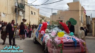 بالصور … اطفال الروضات في القوش يحتفلون بعيد السعانين بأزيائهم الجميلة