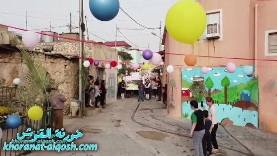 لقطات جوية من احتفالية عيد السعانين لتلاميذ المدارس الابتدائية والروضات في القوش مروراً بأزقتها.