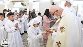 كنيسة القوش تحتفل بمراسيم التناول الاول للوجبة الثانية