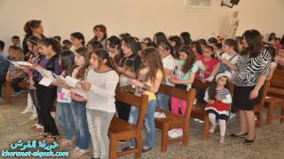 بالصور … الاطفال وطلاب المدارس يحتفلون بعيد القيامة في قداس الهي خاص بهم في القوش