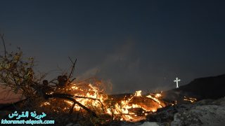 بلدة القوش المسيحية تحتفل بعيد الصليب المقدس وتنير شعلة الصليب في جبلها