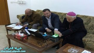 سيادة المطران ميخائيل مقدسي راعي ابرشية القوش يحدث بياناته الشخصية بايومترياً