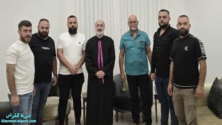 اجتماع لجنة النقل مع خوري كنيسة القوش بمناسبة بدء السنة الدراسية الجديدة