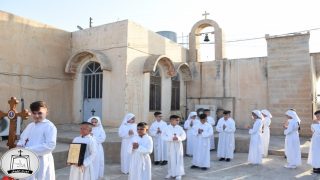 كنيسة القوش تحتفل بمراسيم التناول الاول للوجبة الثالثة والاخيرة