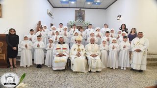 كنيسة القوش تحتفل بمراسيم التناول الاول للوجبة الاولى