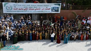 بمشاركة اهلها و مغتربيها، بلدة القوش تحيي مسيرة عيد السعانين2024