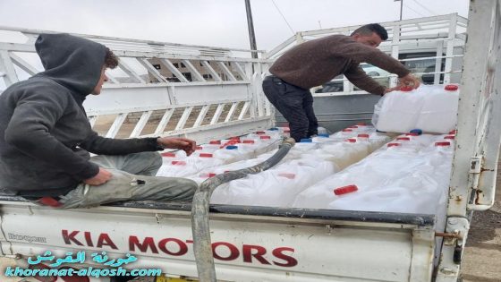 لجنة مار ميخا الخيرية في القوش توزع مادة النفط الابيض للعوائل ذوي الدخل المحدود